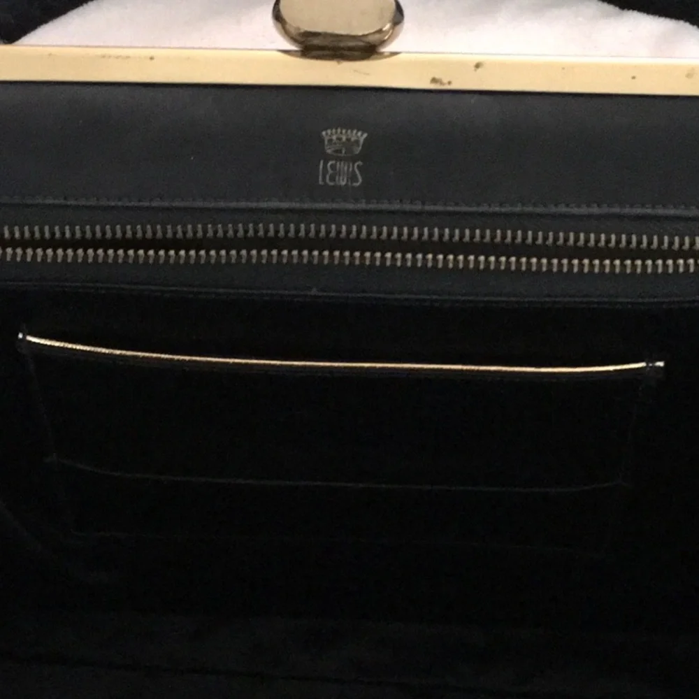 Classic Black Velvet Evening handbag with Gold Accent with fabric lining.